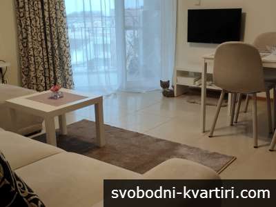 стилно обзаведен апартамент с паркомясто