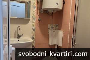 Двустаен в широк център
