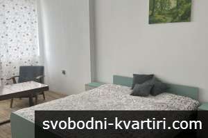 Двустаен в широк център