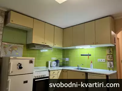 Двустаен в широк център